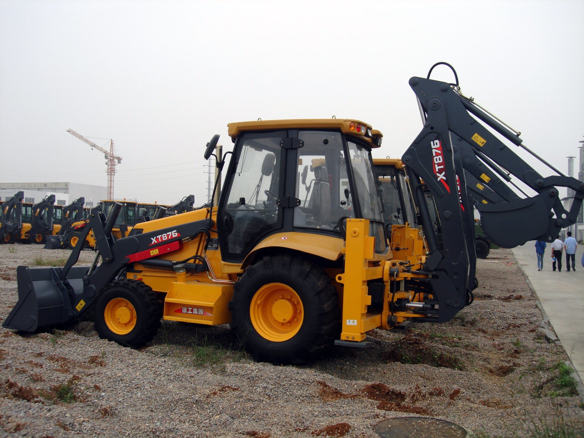 China Backhoe Loader Xt870 Multifunctional Construction Machine with Hammers Snow Plough