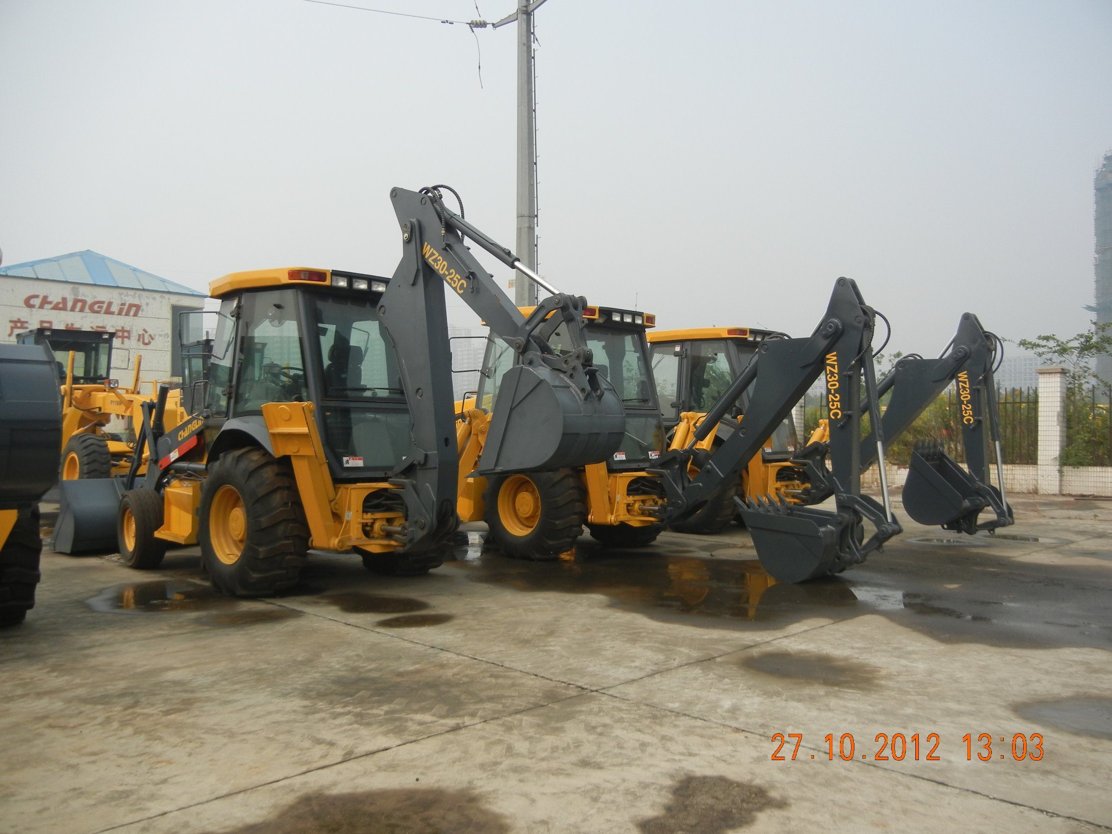 Wz30-25c Good Brand 4WD Backhoe Loader with 4 in 1 Bucker Snow Plough