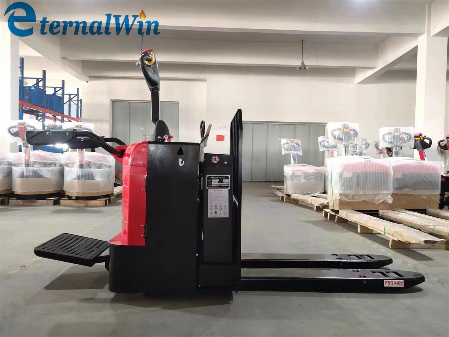 3000kg 24V 210ah Stand on Electric Pallet Truck Drive Type Electric Truck