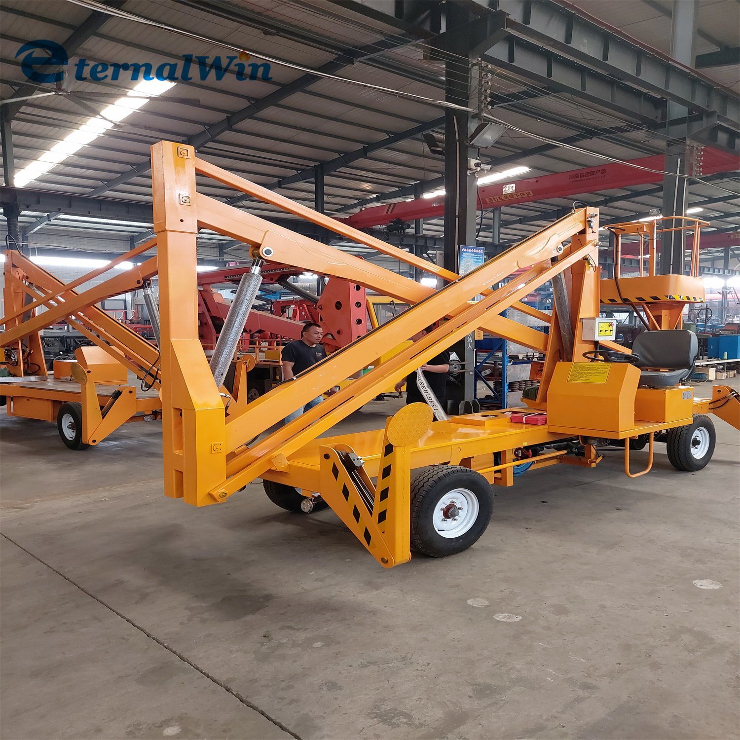 Compact Towable Crank Man Lift Hydraulic Arm Boom Lift for Sale