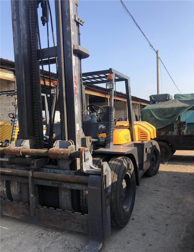 Used Forklift Tcm Fd100 Made in Japan, 10 Ton Hydraulic Forklift with Fork and Oil Pump