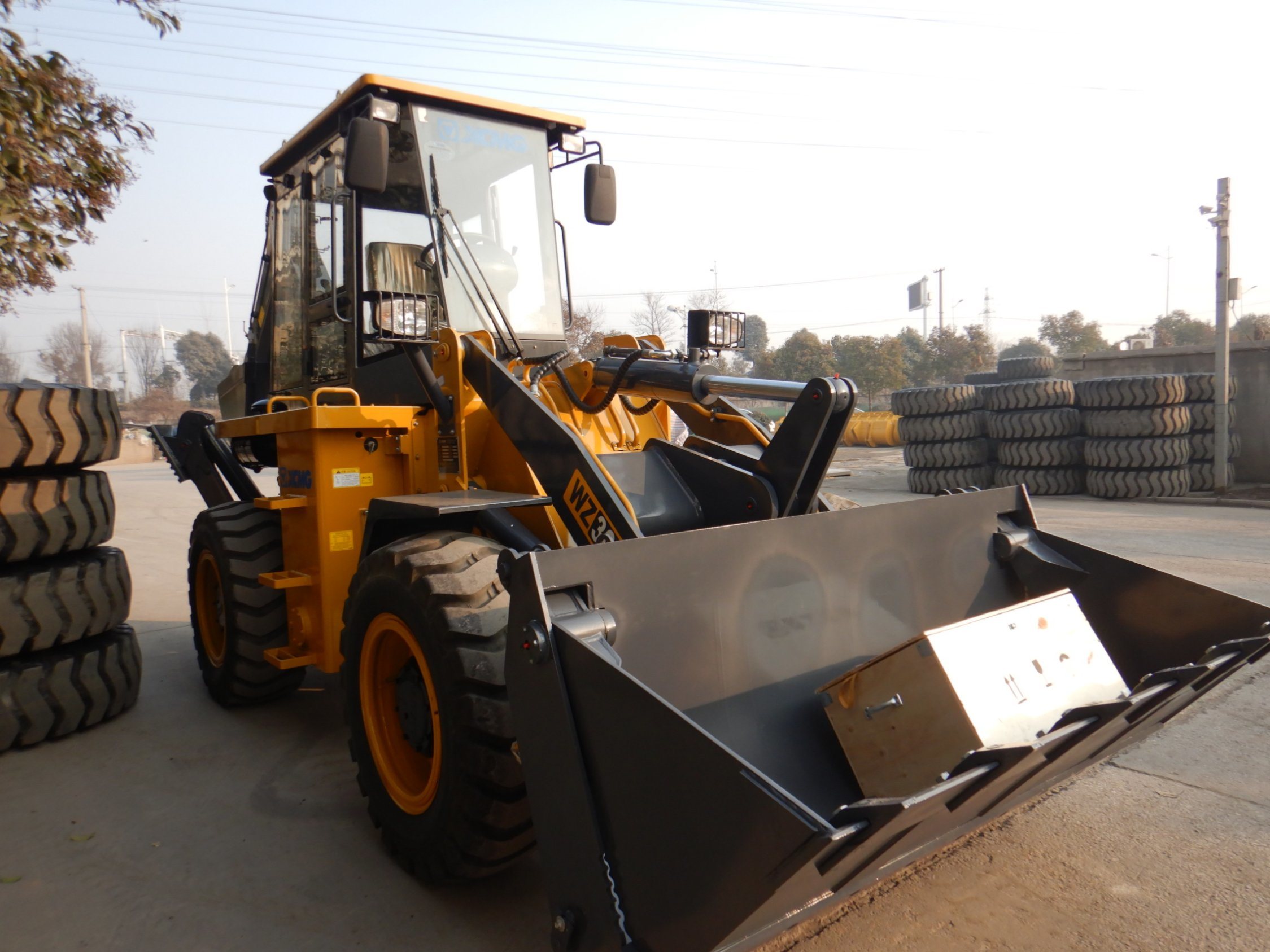 China Xugong Mini Backhoe Loader Wz30-25 with 4 in One Bucket