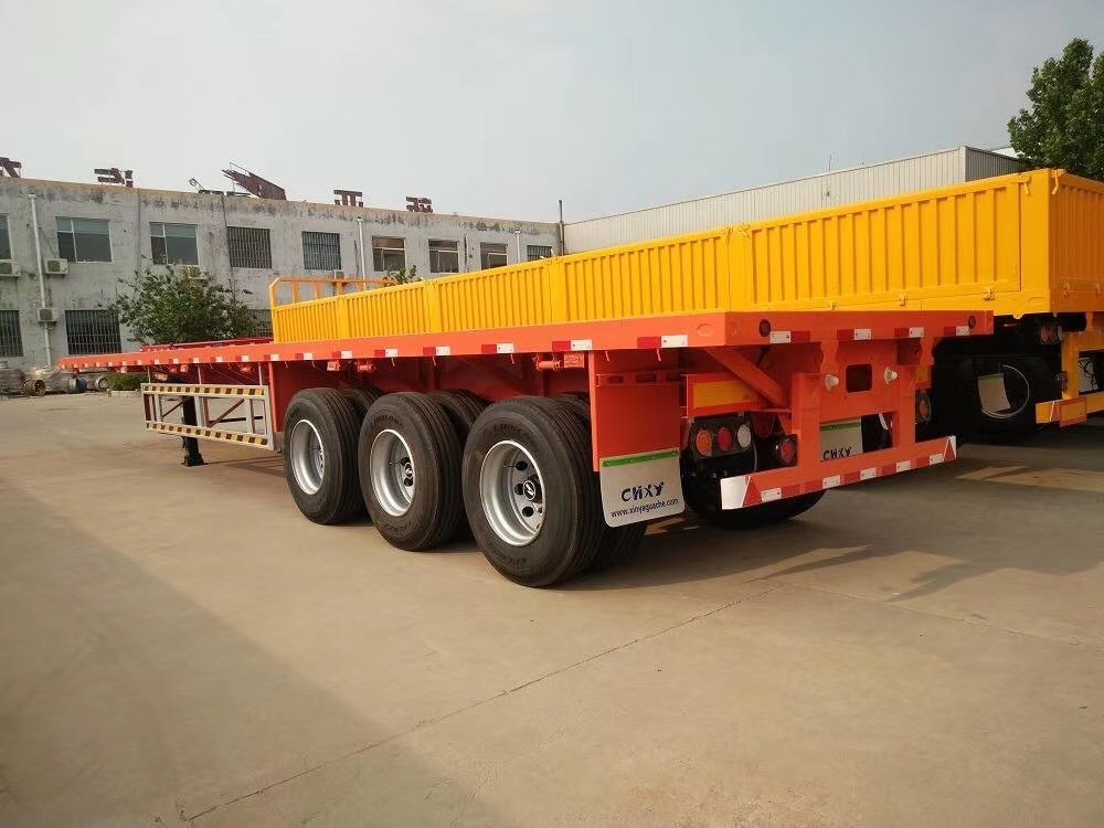 3 Axle 40 Tons 60 Tons Flat Bed Curtain Side Wall Cargo Semi Trailer for Sale