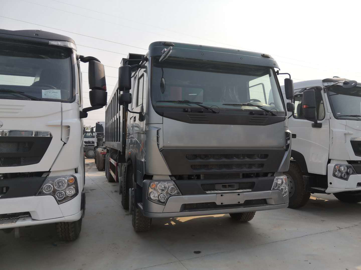 China 
                Zz3167m3811 4X2 zelfdumpende truck High Quality-product
             leverancier