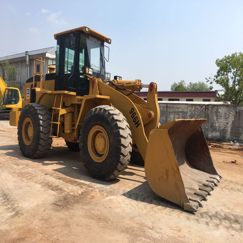 
                Cat 966h ホイールローダを使用し、中古の Caterpillar 966h ローダを運転状態で安価に販売しました
            